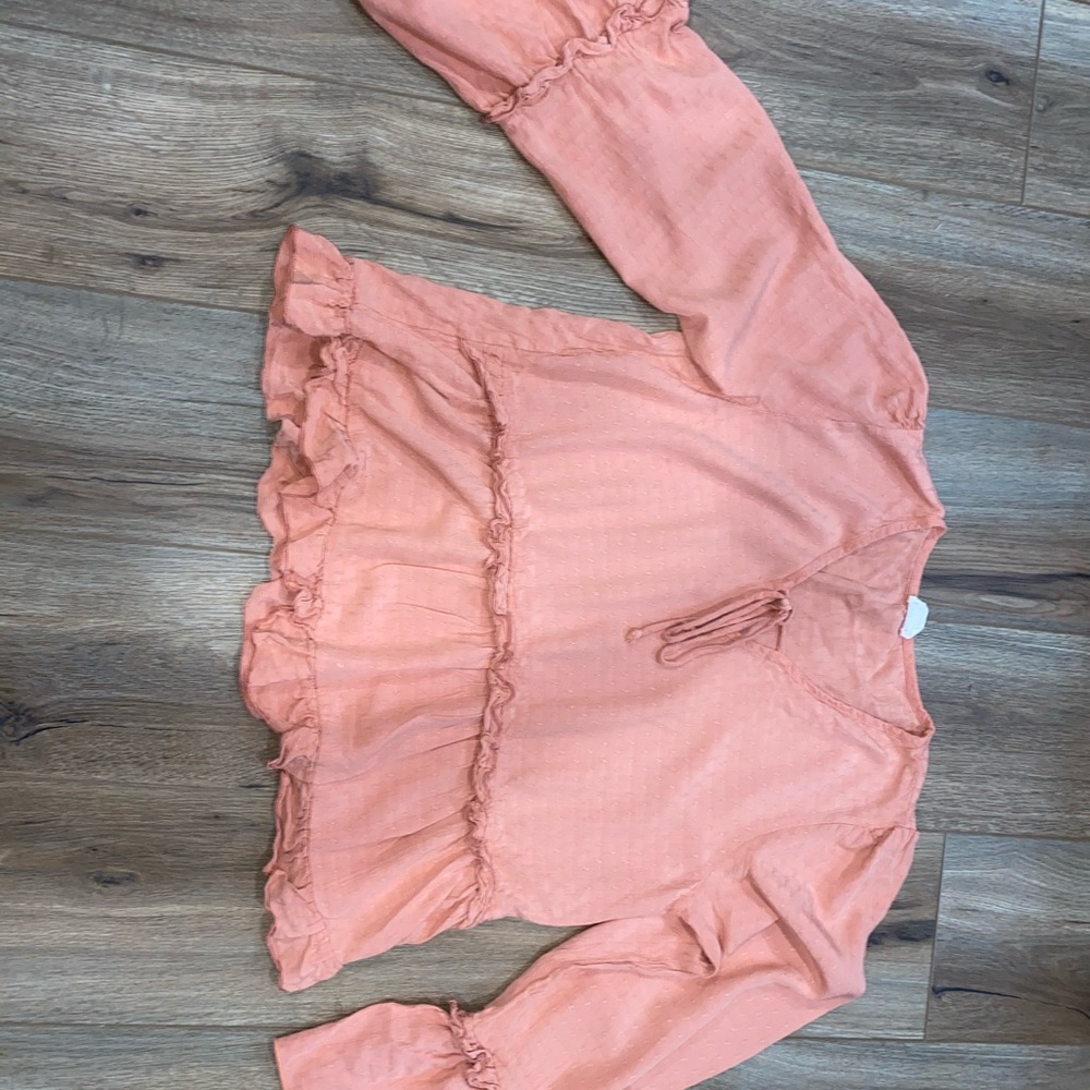 Beautiful coral colored top with flare sleeves